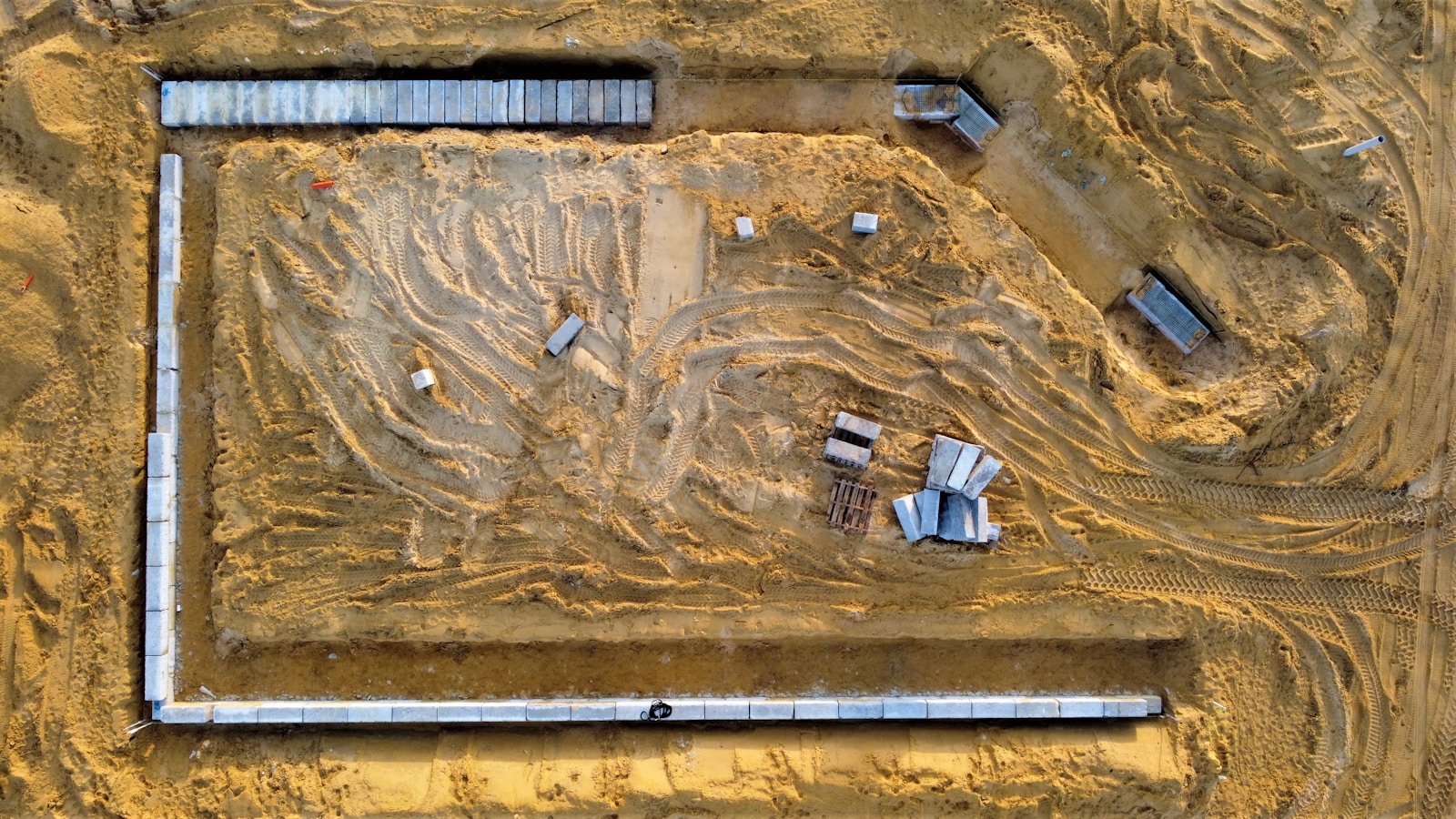 an aerial view of a construction site in the desert